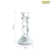 Elegant clear glass pillar candle holder with a flared base and narrow neck