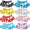 A set of foil balloons in black, gold, silver, red, and blue celebrating a happy birthday.