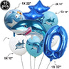 A set of blue shark foil balloons in various sizes including 18 inch, 22 inch, and 32 inch for an ocean-themed party.