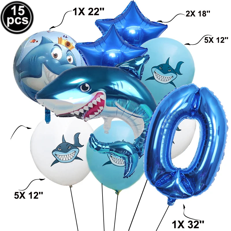 A set of blue shark foil balloons in various sizes including 18 inch, 22 inch, and 32 inch for an ocean-themed party.