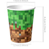 A green and brown Minecraft-themed cup featuring a pixelated block design.