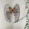 Boho wood angel wing wall shelf featuring a crystal display holder and butterfly design.