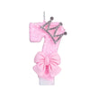 Pink princess birthday candle with a crown topper and bow decoration