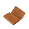 A brown vintage leather card holder and cable organizer folded and displayed on a white background.