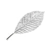A delicate sterling silver tea brewing leaf with intricate veining.
