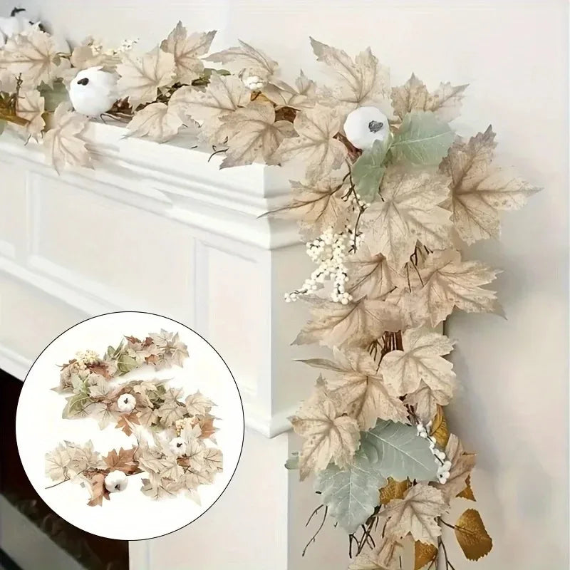 A long garland of artificial maple leaves and white berries used for autumn wedding or home decor