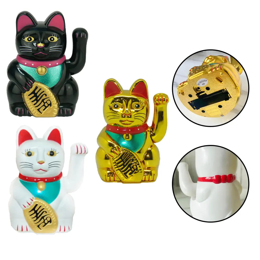 A collection of three electric waving lucky cat figurines in black, gold, and white.