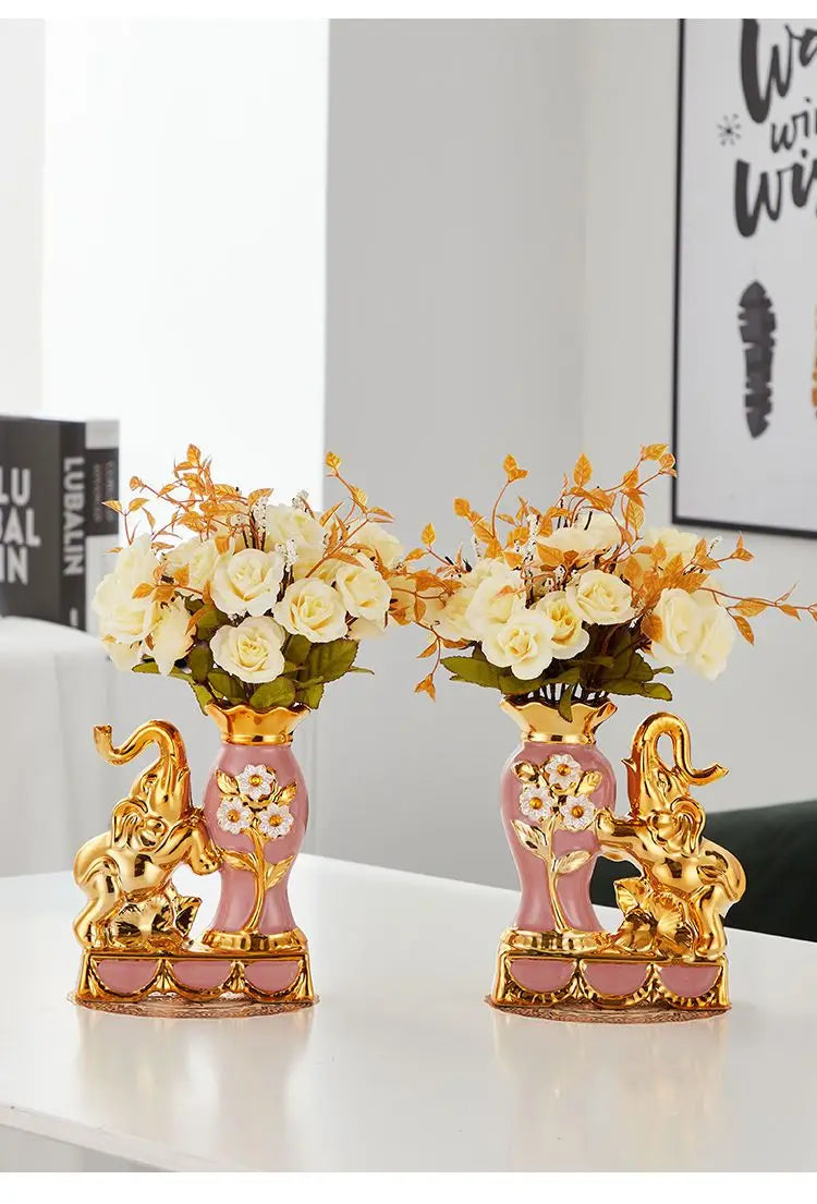Gold ceramic swan vase for tabletop decor featuring floral arrangements