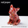 A red jasper dog statue dropper featuring natural crystals with slight chromatic aberrations and small cracks.