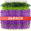 Un paquet de 24 guirlandes de fleurs de wisteria artificielles violettes, disposées en couches.