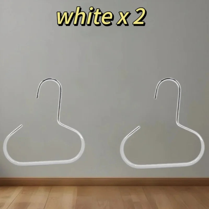 Two white hat organizer racks mounted on a light gray wall.