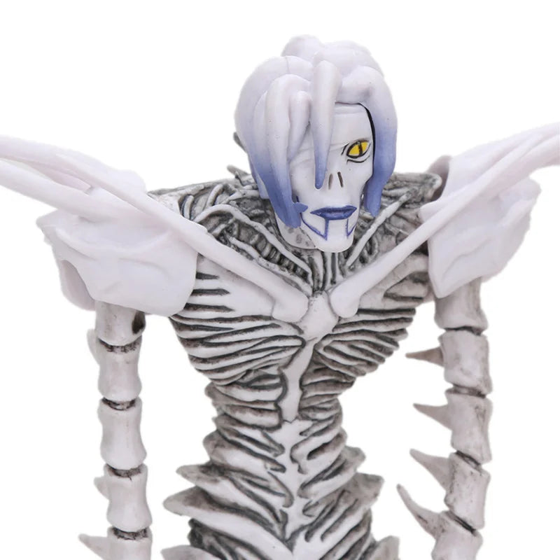 PVC figure of Death Note character Light with white hair and blue eyes, featuring detailed clothing and skeletal elements.