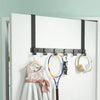Heavy duty aluminum door hooks with six capacity hanging on a white door frame.