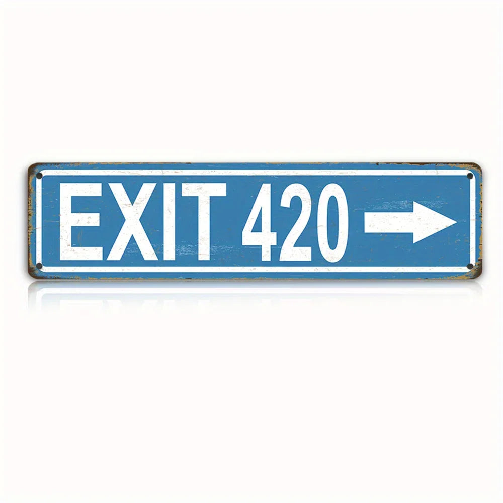 A vintage metal sign with blue and white paint indicating Exit 420 with an arrow pointing right.