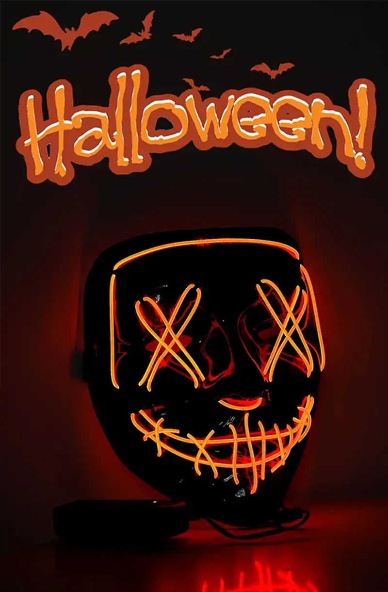 A glowing orange LED Halloween mask featuring a carved skull face and teeth, set against a dark background.