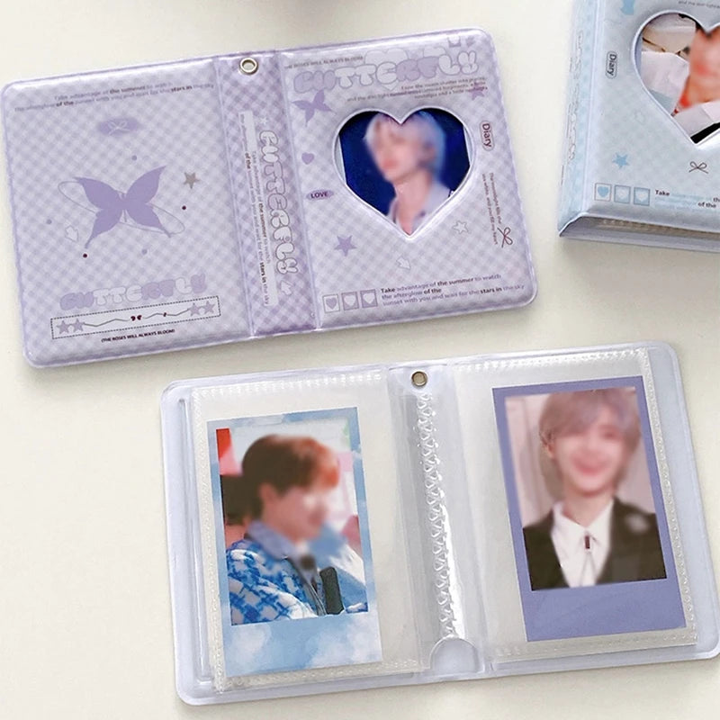 A clear plastic photo card album binder featuring a purple and white design with a heart-shaped cutout and a photo card insid