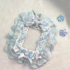 Porte-cartes en dentelle bleu clair décorée de rubans et de charms étoiles
