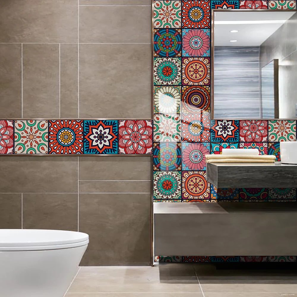 A modern bathroom featuring a wall with colorful mandala peel and stick tiles and a mirrored vanity.