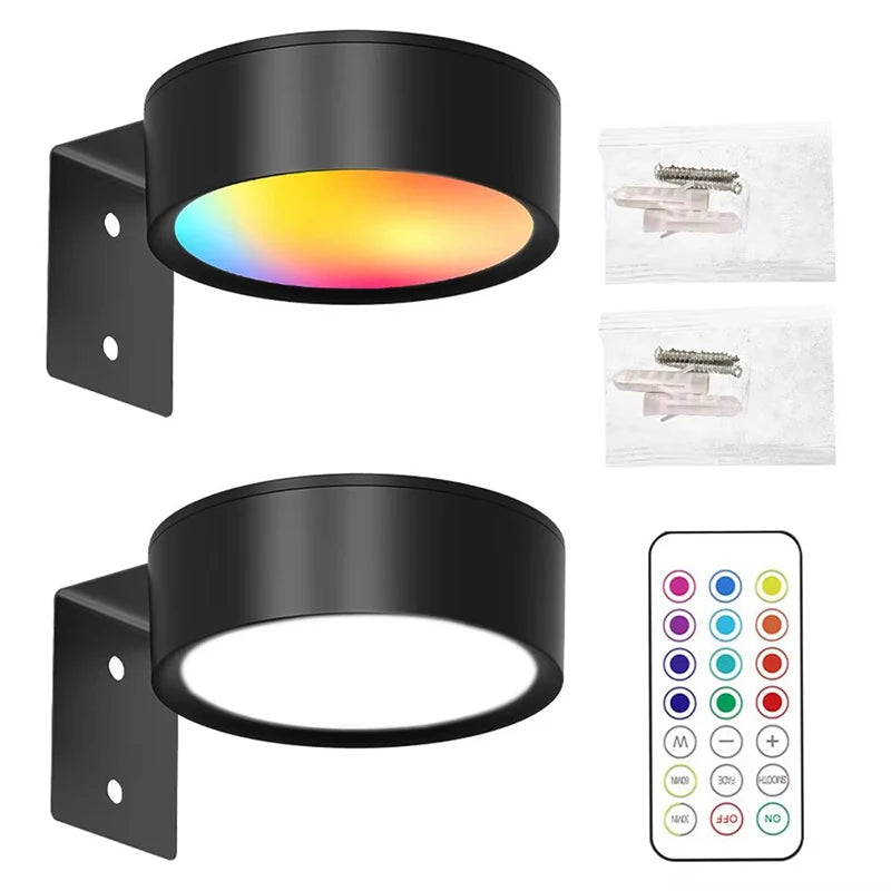 A black LED picture light with a magnetic mount and a remote control, showing various color modes.
