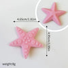 Pink star-shaped polymer clay cake toppers measuring 4.65cm to 4.95cm.