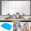 Decorative acrylic mirror mosaic tiles displayed in a bathroom vanity setting.