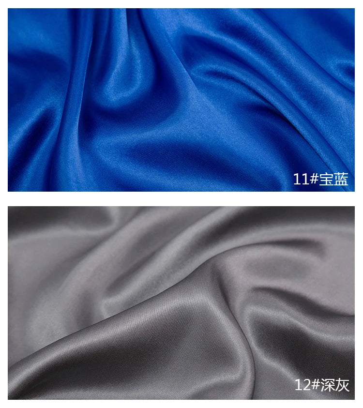 Two swatches of satin fabric, one royal blue and one gray, showing the drape and texture.