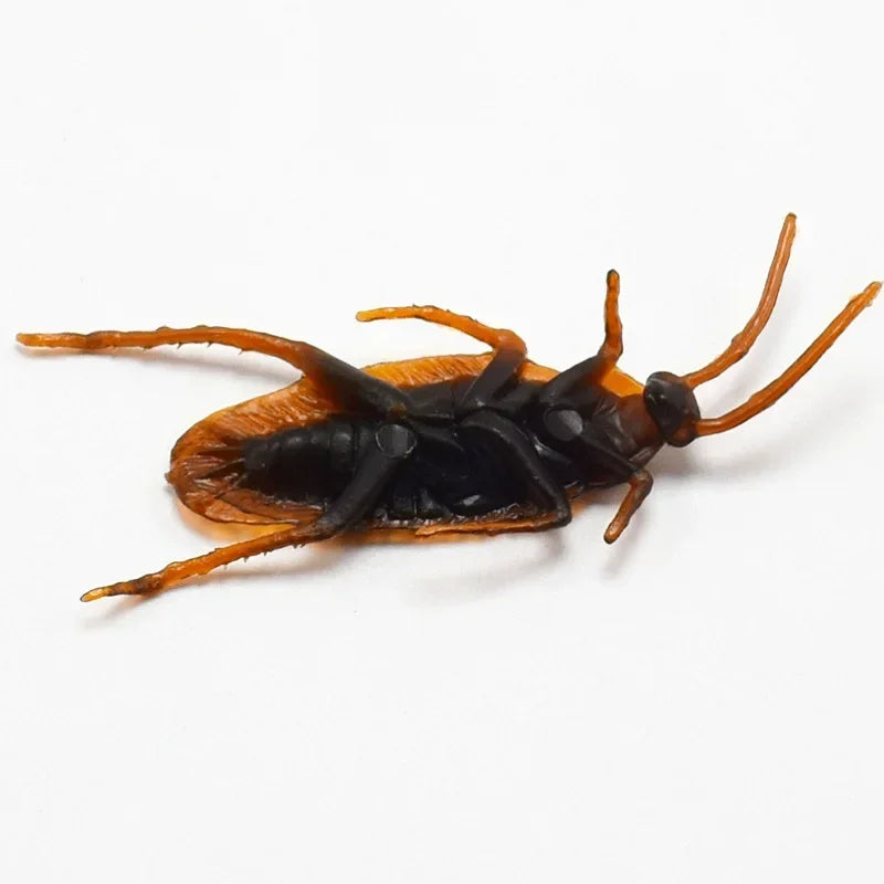 A realistic plastic bug set featuring fake cockroaches, centipedes, and scorpions.