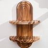 Two wooden wall shelves with a curved, natural wood grain design mounted on a white wall.