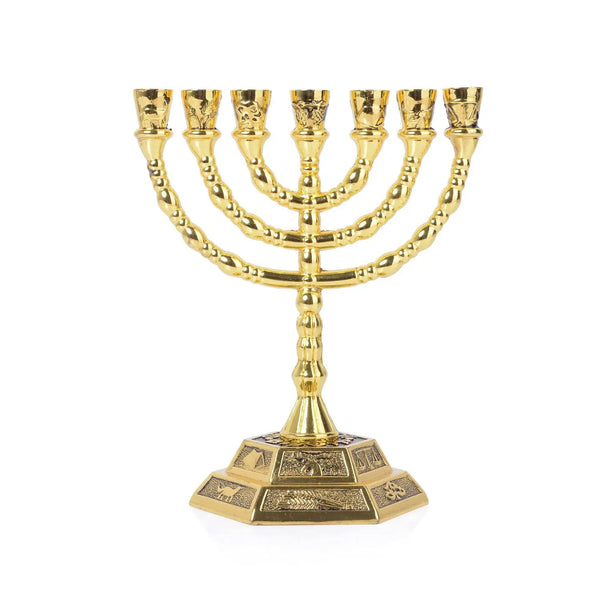 A gold 7-branch Menorah candle holder with a decorative base.