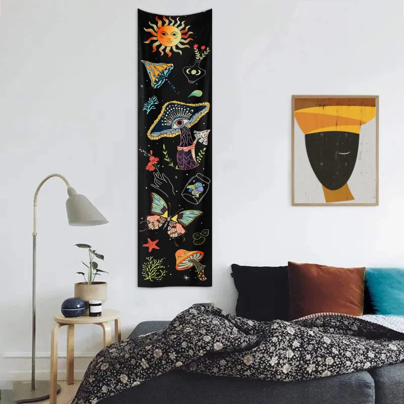 Dark tapestry featuring celestial elements like the sun, moon, and galaxy in yellow, orange, and green tones.