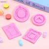 Four pink silicone frame molds for chocolate clay and crafts displayed on a light pink background.