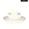 A set of four white reusable plastic tableware items including a bowl and a plate.