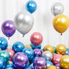 A collection of chrome metallic balloons in various shades including silver, purple, blue, and gold.