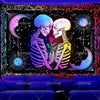 UV reactive chakra lotus tapestry wall hanging featuring skulls and crescent moons against a dark background