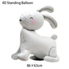 A white foil balloon shaped like a standing bunny cartoon character.