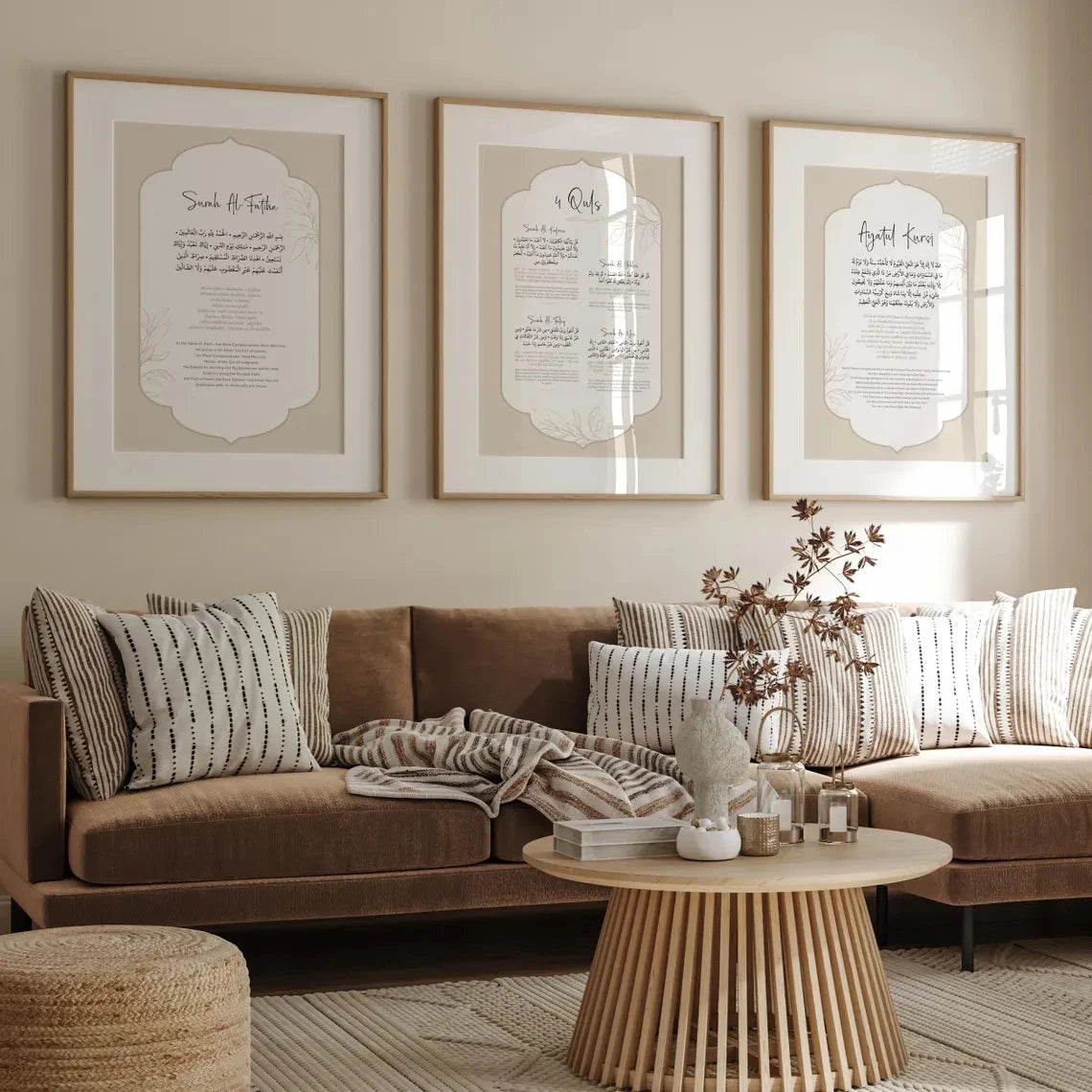 A gallery wall featuring framed Islamic calligraphy prints of Ayatul Kursi, 4 Quls, and Surah Al-Fatiha on a neutral wall.
