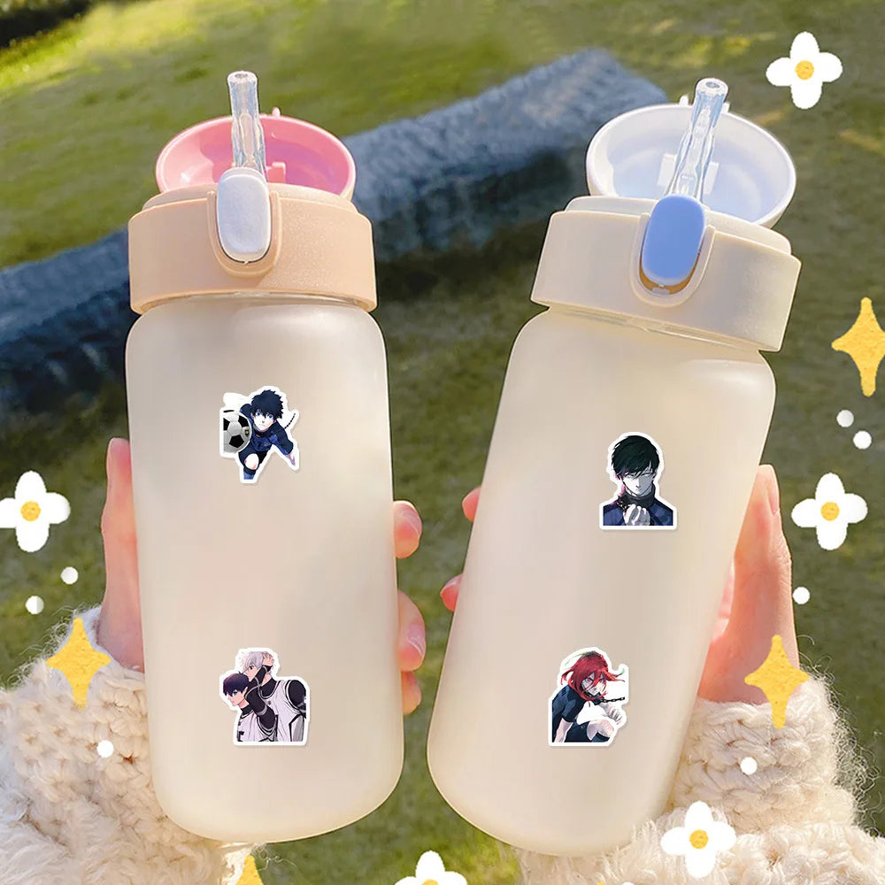 Two clear water bottles with pink lids featuring cartoon graffiti stickers on the bottles