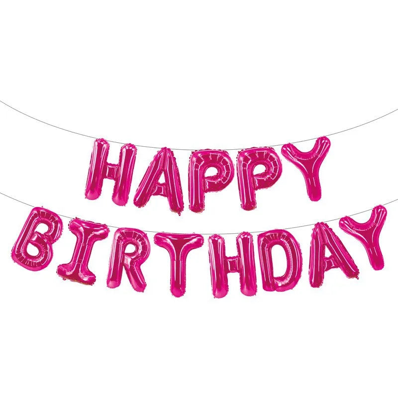 A string of pink letter foil balloons spelling out Happy Birthday for party decoration