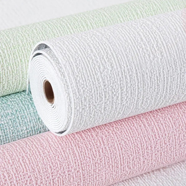 Rolls of self-adhesive 3D linen texture wallpaper panels in white, mint green, and pink.