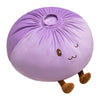 A round, purple dumpling plush pillow with small ears and brown paws.