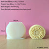 A white silicone mold shaped like a hand with a coiled design, used for making candles or crafts.