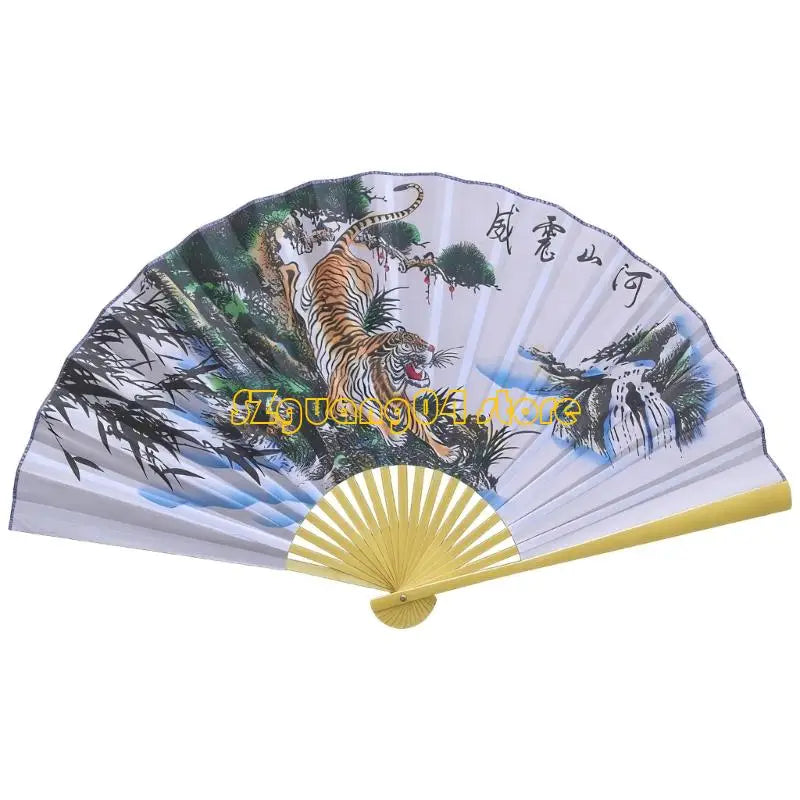 A large decorative Chinese theme wall fan featuring a tiger design and scenic landscape painting.