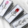 Silver crystal rose artificial flower in a rectangular box with white lining