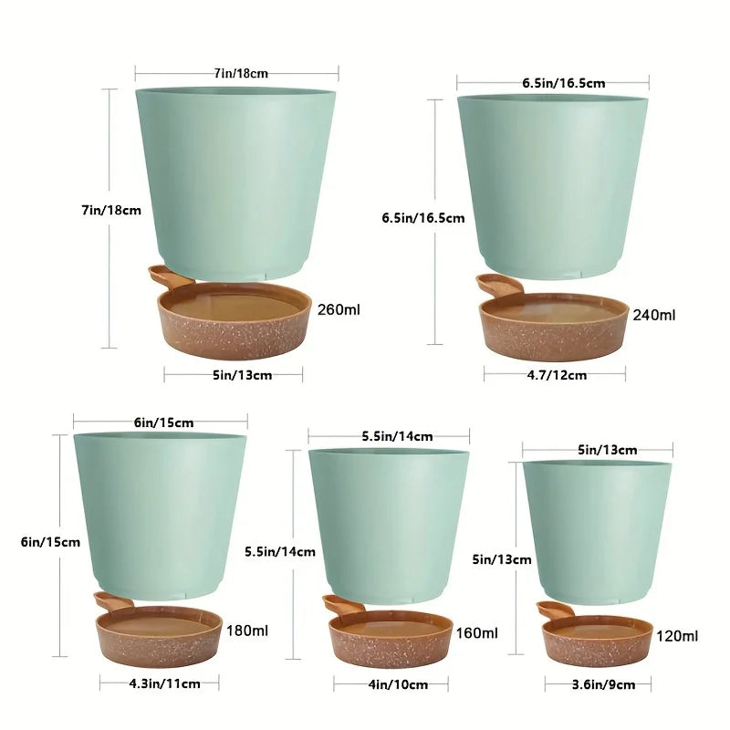 A set of five light mint green self-watering plant pots with drainage holes shown in various sizes.