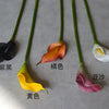 A collection of EVA artificial calla lily stems in various colors including black, orange, yellow, and white.