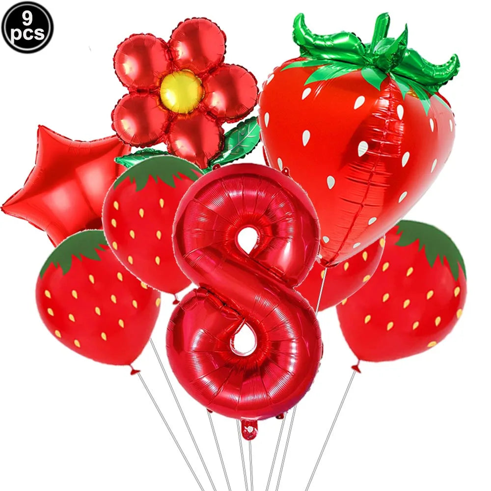 A set of red strawberry and number balloons for a party kit
