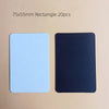 Two rectangular fridge magnets, one light blue and one dark blue, are shown against a beige background.