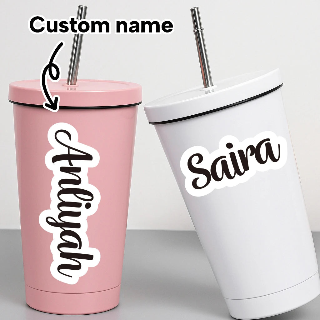 A pink tumbler with a custom name sticker reading Aniyah and a white tumbler with a custom name sticker reading Saira.