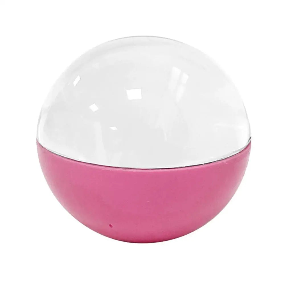 Pink and white spherical crystal ball video player with a clear dome top
