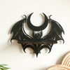 Black gothic bat and moon floating wall decor silhouette on a white wall.